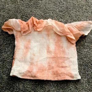 pink and white tie dye tube top. has a little ruffle going down